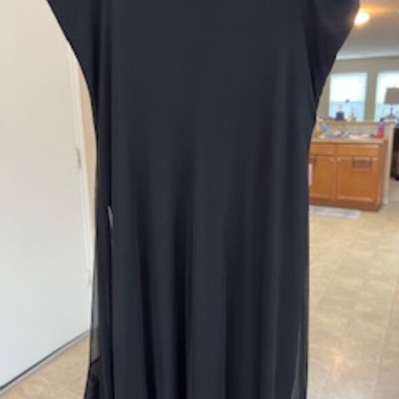 Black formal girls dress with multiple layers of sheer ruffles at the bottom. - Picture 7 of 7